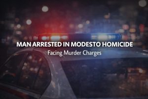 Law enforcement crime scene tape at Modesto homicide investigation site